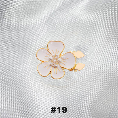 Floral diamond sleeve buttons
