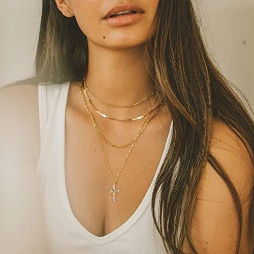 Stone laid cross rotated crown necklace