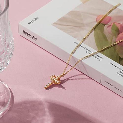 Stone laid cross rotated crown necklace
